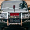Front view of a luxury black SUV parked in Dhaka, showcasing design and elegance.